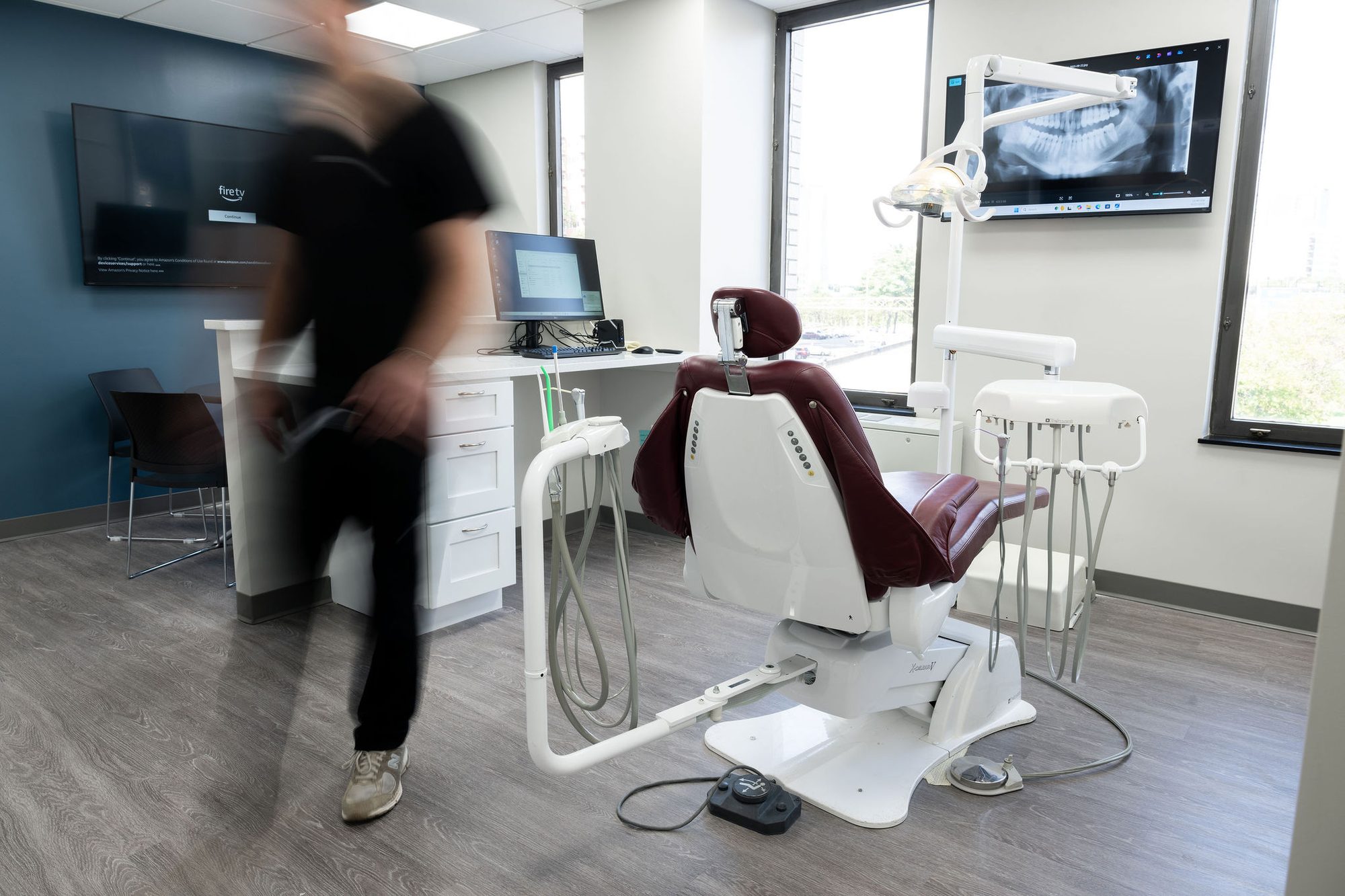 Dental team responding quickly to a patient emergency